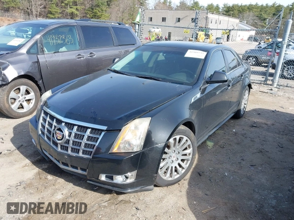 2012 Cadillac CTS with VIN 1G6DM5E39C0106931, listed as a IAAI auction lot 41909732 with 213,319 mi miles and . Bid and sale history available at DreamBid. Image 2.