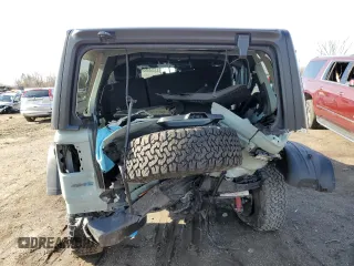 2024 Jeep Wrangler Rubicon with VIN 1C4RJXR61RW255979, listed as a Copart auction lot 43451095 with 7,258 mi miles and Salvage title. Bid and sale history available at DreamBid. Image 6.