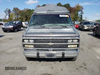 1994 Chevrolet Chevy Van z VIN 1GBEG25K5RF123489, wystawiony jako Copart lot #79491854 z przebiegiem 82 970 mil mil oraz Szkoda całkowita • Salvage title. Historia ofert i sprzedaży dostępna na DreamBid. Obrazek 5.