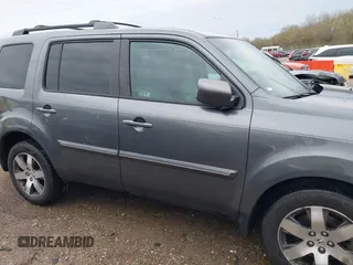 2012 Honda Pilot Touring with VIN 5FNYF4H98CB065003, listed as a IAAI auction lot 41989829 with 91,607 mi miles and . Bid and sale history available at DreamBid. Image 13.