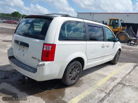 2010 Dodge Grand Caravan SE with VIN 2D4RN4DE5AR490306, listed as a IAAI auction lot 41944376 with 127,107 mi miles. Bid and sale history available at carsss.com. Image 4.
