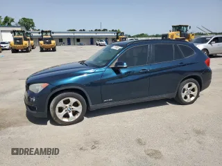 2013 BMW X1 28i z VIN WBAVM1C59DVW41709, wystawiony jako Copart lot #57316485 z przebiegiem 115 563 mil mil oraz Tytuł czysty. Historia ofert i sprzedaży dostępna na DreamBid. Obrazek 1.
