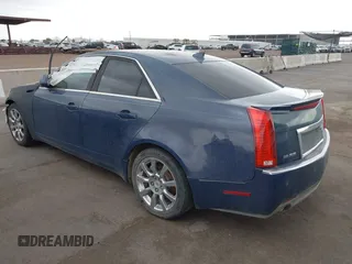 2009 Cadillac CTS RWD w/1SB with VIN 1G6DV57V690111847, listed as a IAAI auction lot 42189418 with 144,790 mi miles. Bid and sale history available at carsss.com. Image 3.