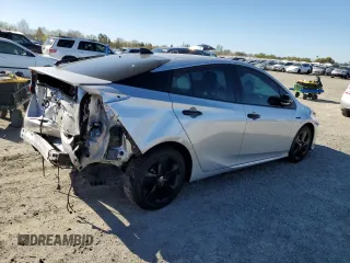 2022 Toyota Prius L Eco with VIN JTDKAMFU6N3174068, listed as a Copart auction lot 50403295 with 102,265 mi miles and Salvage Title. Bid and sale history available at DreamBid. Image 3.