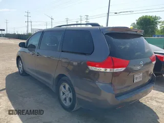 2012 Toyota Sienna LE AAS with VIN 5TDKK3DC8CS180967, listed as a IAAI auction lot 42215961 with 220,089 mi miles and . Bid and sale history available at DreamBid. Image 3.