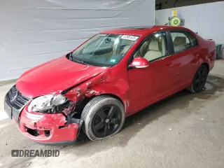 2009 Volkswagen Jetta SE z VIN 3VWRZ71K69M011873, wystawiony jako Copart lot #52881525 z przebiegiem 154 441 mil mil oraz Szkoda całkowita • Salvage title. Historia ofert i sprzedaży dostępna na DreamBid. Obrazek 1.