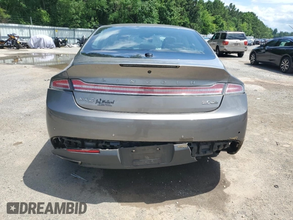 2016 Lincoln MKZ z VIN 3LN6L2J96GR601039, wystawiony jako Copart lot #63209425 z przebiegiem 151 629 mil mil oraz Szkoda całkowita • Salvage title. Historia ofert i sprzedaży dostępna na DreamBid. Obrazek 6.