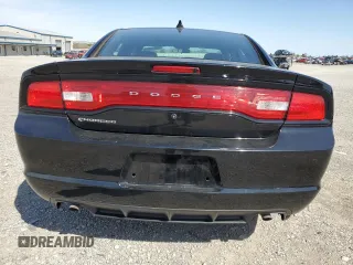 2014 Dodge Charger Police with VIN 2C3CDXAG0EH357871, listed as a Copart auction lot 52650555 with 143,334 mi miles and Salvage Title. Bid and sale history available at DreamBid. Image 6.