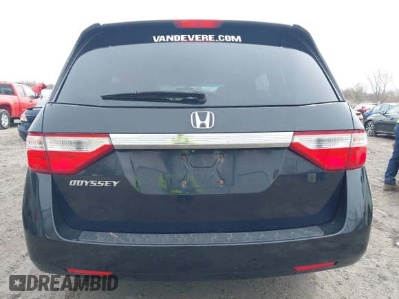 2012 Honda Odyssey EX-L with VIN 5FNRL5H63CB070361, listed as a IAAI auction lot 42025024 with 152,258 mi miles and . Bid and sale history available at carsss.com. Image 16.