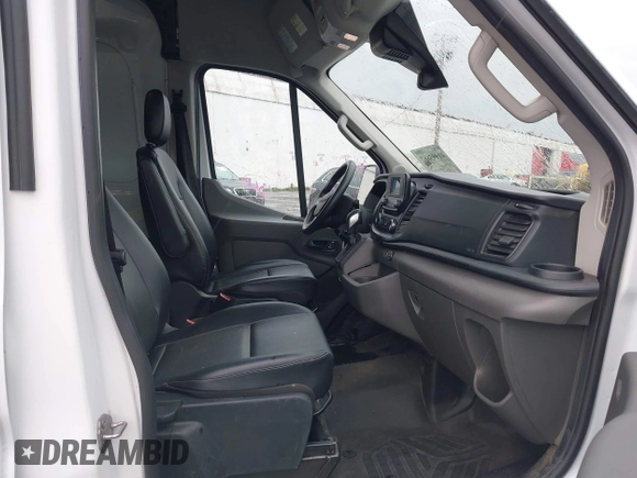 2023 Ford Transit Cargo with VIN 1FTBR3U89PKA09391, listed as a IAAI auction lot 41993662 with 36,147 mi miles and . Bid and sale history available at DreamBid. Image 5.