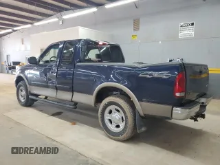 2002 Ford F-150 XL with VIN 1FTRX18L62NA69837, listed as a Copart auction lot 61581935 with 130,078 mi miles and Salvage title. Bid and sale history available at DreamBid. Image 2.