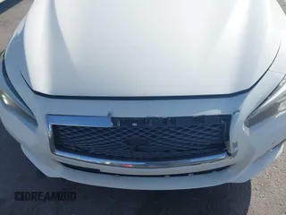 2015 Infiniti Q50 Premium z VIN JN1BV7ARXFM416349, wystawiony jako IAAI lot #42225088 z przebiegiem 194 127 mil mil oraz . Historia ofert i sprzedaży dostępna na DreamBid. Obrazek 6.