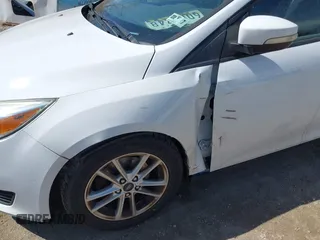 2016 Ford Focus SE with VIN 1FADP3F2XGL354565, listed as a IAAI auction lot 41590623 with 120,047 mi miles. Bid and sale history available at carsss.com. Image 13.