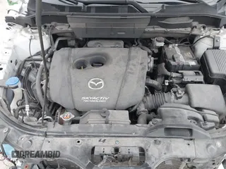 2018 Mazda CX-5 Touring z VIN JM3KFBCM6J0323107, wystawiony jako IAAI lot #41895519 z przebiegiem 86 124 mil mil oraz . Historia ofert i sprzedaży dostępna na DreamBid. Obrazek 10.