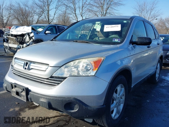 2009 Honda CR-V EX with VIN 3CZRE38589G704086, listed as a IAAI auction lot 41348951 with 128,784 mi miles and . Bid and sale history available at carsss.com. Image 17.