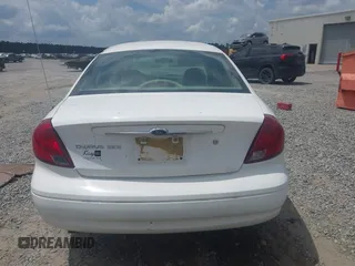 2001 Ford Taurus SES z VIN 1FAFP55U01G285537, wystawiony jako IAAI lot #42213046 z przebiegiem 110 424 mil mil oraz . Historia ofert i sprzedaży dostępna na DreamBid. Obrazek 16.