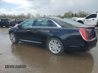 2018 Cadillac XTS Luxury with VIN 2G61N5S36J9165068, listed as a Copart auction lot 55471285 with 111,787 mi miles and Salvage title. Bid and sale history available at DreamBid. Image 2.