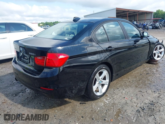 2013 BMW 3 Series 320i xDrive with VIN WBA3C3C52DF979114, listed as a IAAI auction lot 42439598 with 111,458 mi miles and . Bid and sale history available at DreamBid. Image 4.