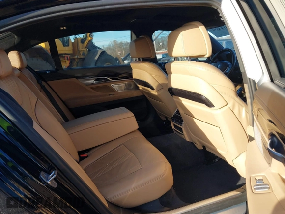 2017 BMW 7 Series 750i with VIN WBA7F0C34HGM21805, listed as a IAAI auction lot 41446797 with 88,753 mi miles and . Bid and sale history available at DreamBid. Image 8.