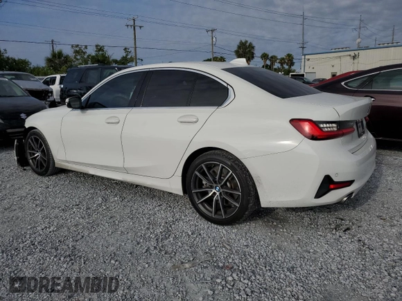 2020 BMW 3 Series 330i with VIN WBA5R1C0XLFH39262, listed as a Copart auction lot 57398585 with 55,456 mi miles and Salvage title. Bid and sale history available at DreamBid. Image 2.