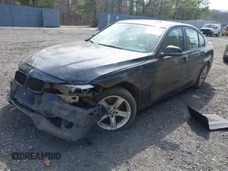 2013 BMW 3 Series 328i xDrive with VIN WBA3B5G59DNS01455, listed as a IAAI auction lot 41788947 with 127,677 mi miles. Bid and sale history available at carsss.com. Image 2.