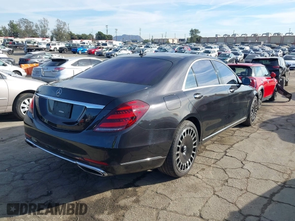 2018 Mercedes-Benz S 560 with VIN WDDUG8DB0JA385097, listed as a IAAI auction lot 41384874 with 76,423 mi miles and . Bid and sale history available at carsss.com. Image 4.