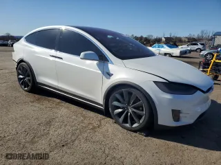2017 Tesla Model X 90D with VIN 5YJXCBE21HF044498, listed as a Copart auction lot 49305475 with 86,064 mi miles and Salvage Title. Bid and sale history available at carsss.com. Image 4.