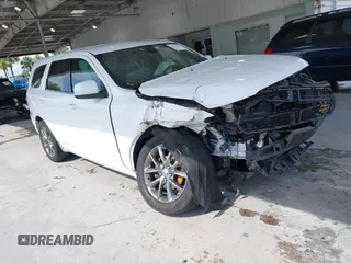 2015 Dodge Durango SXT with VIN 1C4RDHAG4FC113706, listed as a IAAI auction lot 42395119 with 210,453 mi miles and . Bid and sale history available at DreamBid. Image 1.
