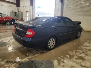 2003 Toyota Camry LE z VIN 4T1BF30K23U058761, wystawiony jako Copart lot #51286985 z przebiegiem 90 143 mil mil oraz Nie do naprawy • Non repairable. Historia ofert i sprzedaży dostępna na DreamBid. Obrazek 3.