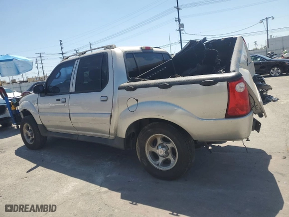 2004 Ford Explorer Sport Trac XLS with VIN 1FMZU67K34UB93390, listed as a Copart auction lot 53912075 with 220,520 mi miles and Salvage Title. Bid and sale history available at carsss.com. Image 2.