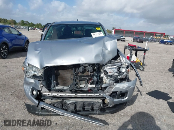 2017 Toyota Tacoma SR5 z VIN 5TFRZ5CN1HX042942, wystawiony jako IAAI lot #41719279 z przebiegiem 82 108 mil mil oraz . Historia ofert i sprzedaży dostępna na DreamBid. Obrazek 12.
