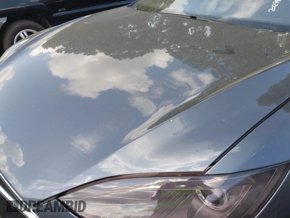 2014 Tesla Model S P85D with VIN 5YJSA1H29EFP63032, listed as a IAAI auction lot 42132145 with Not Provided miles and . Bid and sale history available at DreamBid. Image 10.