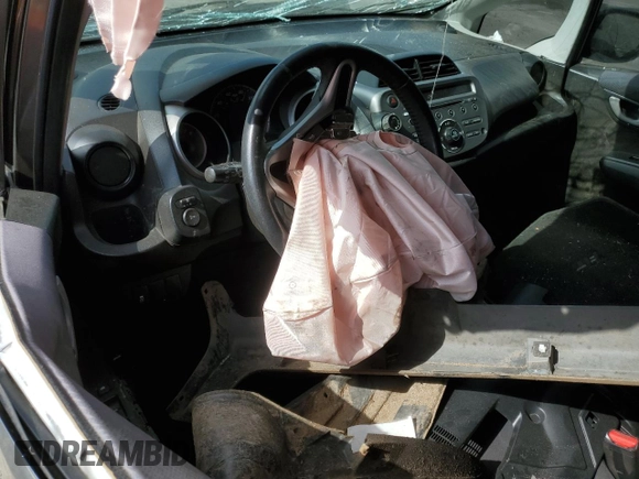2011 Honda Fit Sport z VIN JHMGE8H52BS006399, wystawiony jako Copart lot #57435205 z przebiegiem Nie podano mil oraz Szkoda całkowita • Salvage title. Historia ofert i sprzedaży dostępna na DreamBid. Obrazek 8.