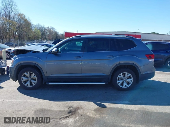 2018 Volkswagen Atlas SE with VIN 1V2CR2CA0JC571988, listed as a IAAI auction lot 41848862 with 96,426 mi miles and . Bid and sale history available at DreamBid. Image 14.
