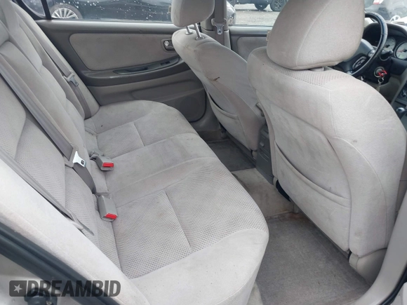 2002 Nissan Maxima GXE z VIN JN1DA31D32T437223, wystawiony jako IAAI lot #42274090 z przebiegiem 111 791 mil mil oraz . Historia ofert i sprzedaży dostępna na DreamBid. Obrazek 8.