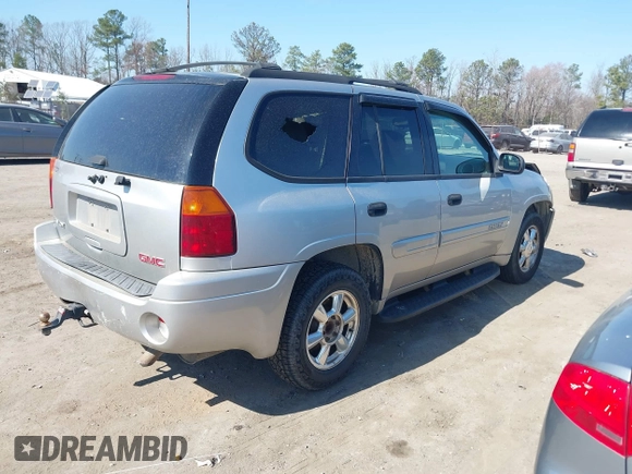 2005 GMC Envoy SLT with VIN 1GKDT13S952219826, listed as a IAAI auction lot 41783713 with 212,908 mi miles. Bid and sale history available at carsss.com. Image 4.