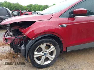 2013 Ford Escape SE z VIN 1FMCU0GX2DUD33640, wystawiony jako IAAI lot #42255552 z przebiegiem 150 018 mil mil oraz . Historia ofert i sprzedaży dostępna na DreamBid. Obrazek 13.