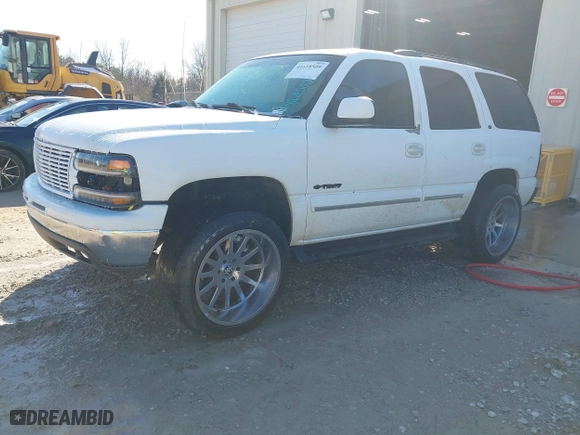 2003 Chevrolet Tahoe LS with VIN 1GNEC13Z73R126800, listed as a IAAI auction lot 41618509 with 267,234 mi miles. Bid and sale history available at carsss.com. Image 2.