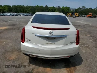 2014 Cadillac XTS Luxury z VIN 2G61M5S38E9215641, wystawiony jako Copart lot #53188695 z przebiegiem 97 431 mil mil oraz Szkody całkowita. Historia ofert i sprzedaży dostępna na DreamBid. Obrazek 6.