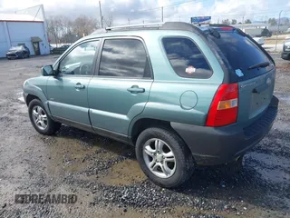 2005 Kia Sportage LX with VIN KNDJE723357058608, listed as a IAAI auction lot 41564533 with 262,794 mi miles and . Bid and sale history available at carsss.com. Image 3.