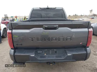 2023 Toyota Tundra Limited Hybrid with VIN 5TFJC5DB7PX021014, listed as a IAAI auction lot 42067753 with 64,991 mi miles and . Bid and sale history available at DreamBid. Image 16.