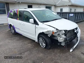 2014 Dodge Grand Caravan SXT with VIN 2C4RDGCG6ER361842, listed as a IAAI auction lot 41827951 with 100,845 mi miles and . Bid and sale history available at DreamBid. Image 1.