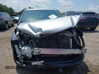 2019 Toyota Highlander SE with VIN 5TDJZRFH6KS614952, listed as a IAAI auction lot 42636713 with 65,471 mi miles and . Bid and sale history available at DreamBid. Image 13.