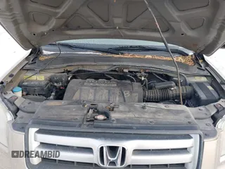 2006 Honda Pilot EX-L with VIN 2HKYF18526H546575, listed as a IAAI auction lot 41414263 with 118,872 mi miles and . Bid and sale history available at DreamBid. Image 10.