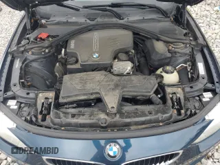 2015 BMW 4 Series 428i xDrive with VIN WBA4C9C57FD330687, listed as a Copart auction lot 67639034 with 114,779 mi miles and Salvage title. Bid and sale history available at DreamBid. Image 11.