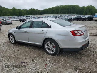 2015 Ford Taurus SEL with VIN 1FAHP2H84FG150932, listed as a Copart auction lot 61298455 with 82,419 mi miles and Clean title. Bid and sale history available at DreamBid. Image 2.