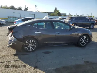 2016 Nissan Maxima SL with VIN 1N4AA6AP4GC900754, listed as a Copart auction lot 60664465 with 72,218 mi miles and Salvage title. Bid and sale history available at DreamBid. Image 3.