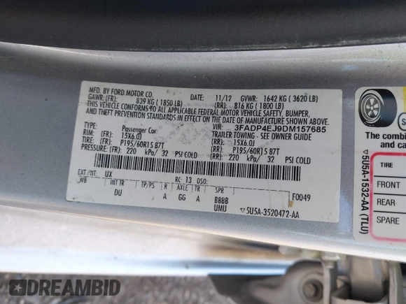 2013 Ford Fiesta SE with VIN 3FADP4EJ9DM157685, listed as a IAAI auction lot 42145511 with 101,331 mi miles. Bid and sale history available at carsss.com. Image 9.