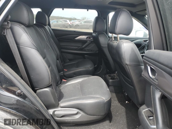 2021 Mazda CX-9 Carbon Edition z VIN JM3TCADY9M0514372, wystawiony jako Copart lot #52902555 z przebiegiem 99 812 mil mil oraz Szkoda całkowita • Salvage title. Historia ofert i sprzedaży dostępna na DreamBid. Obrazek 11.