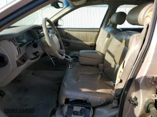 1999 Buick Park Avenue with VIN 1G4CW52K6X4653731, listed as a Copart auction lot 72736444 with 128,471 mi miles and Salvage Title. Bid and sale history available at carsss.com. Image 7.